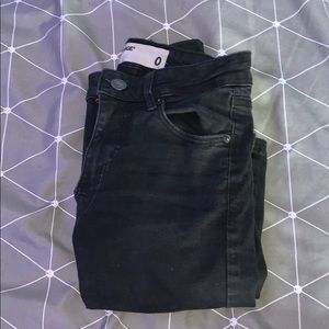 garage black ripped jeans